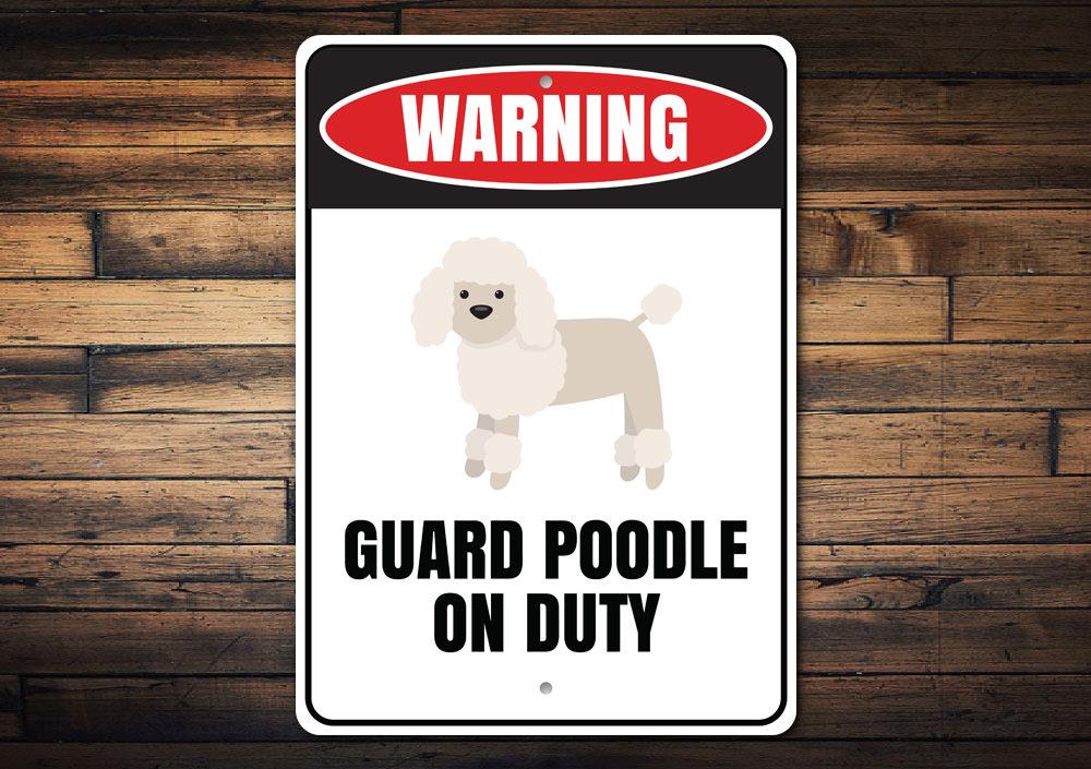 Guard Poodle on Duty Sign made of durable aluminum, featuring a playful design perfect for home decor.