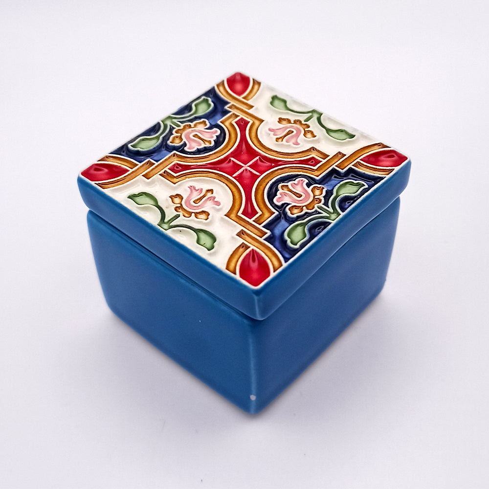 A beautifully handcrafted Guimarães Ceramic Box featuring intricate patterns and vibrant colors, perfect for home decor.