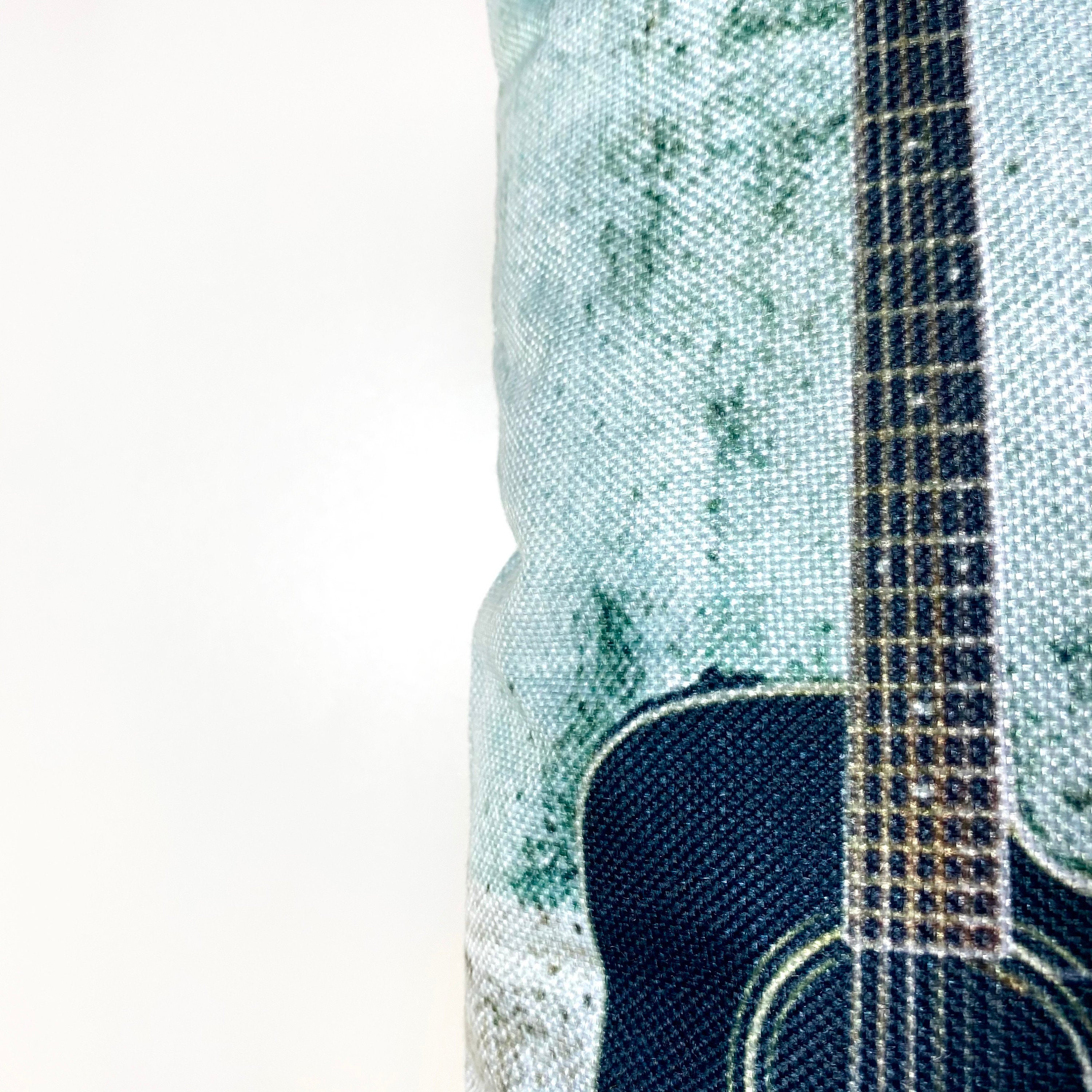 Handmade guitar pillow cover featuring a quote about music, perfect for home decor.