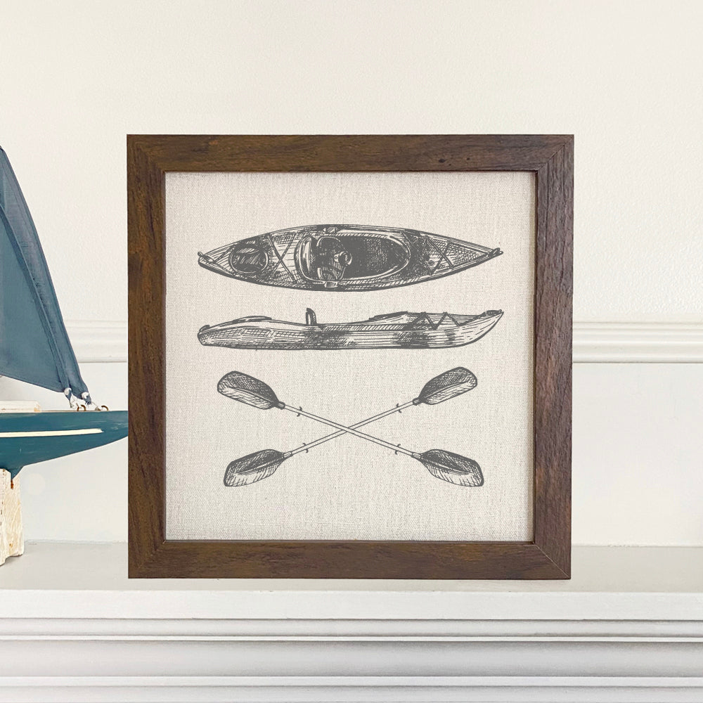Hand Drawn Kayak Framed Sign with a natural wood frame and linen-look background, showcasing a beautiful kayak illustration.