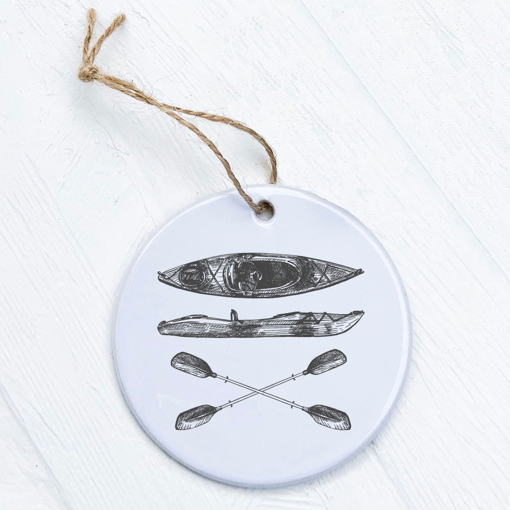 Hand Drawn Kayak Ornament made of high-quality porcelain featuring a unique kayak design, perfect for gifts and decorations.