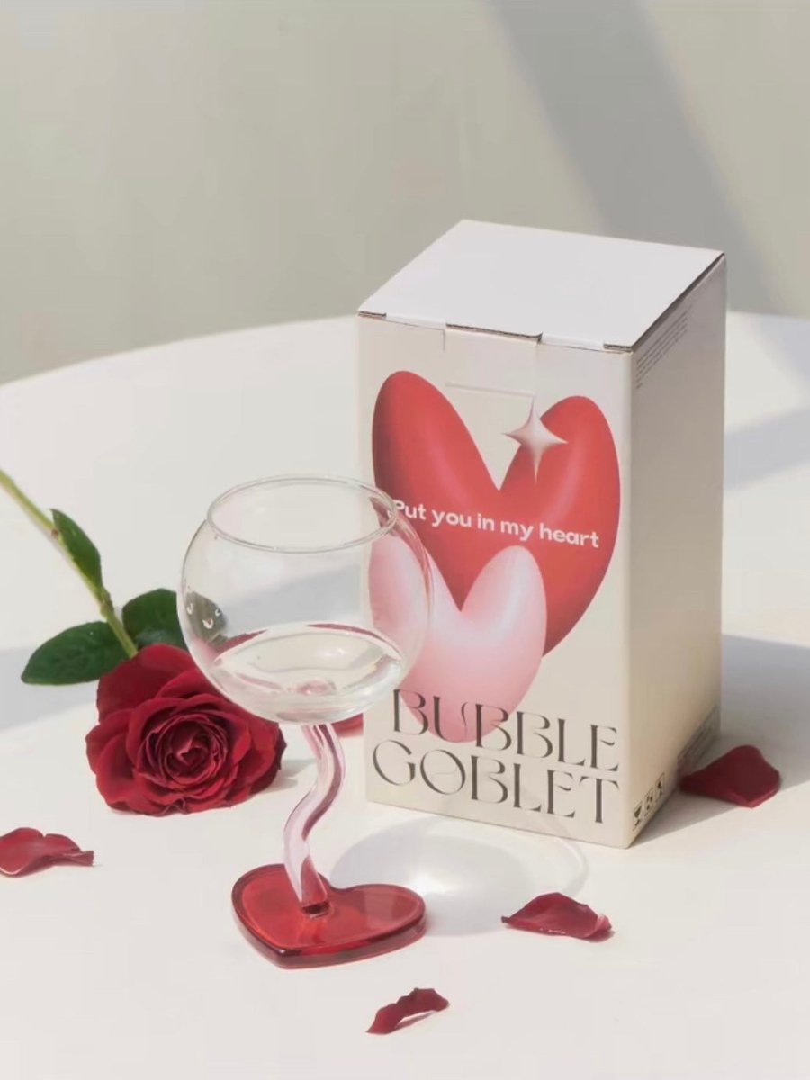 Handblown Bubble Wine Glass featuring a colorful, whimsical design with a wavy stem, perfect for enhancing wine tasting experiences.