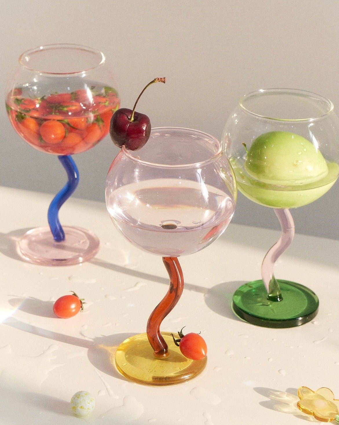 Handblown Bubble Wine Glass featuring a colorful, whimsical design with a wavy stem, perfect for enhancing wine tasting experiences.
