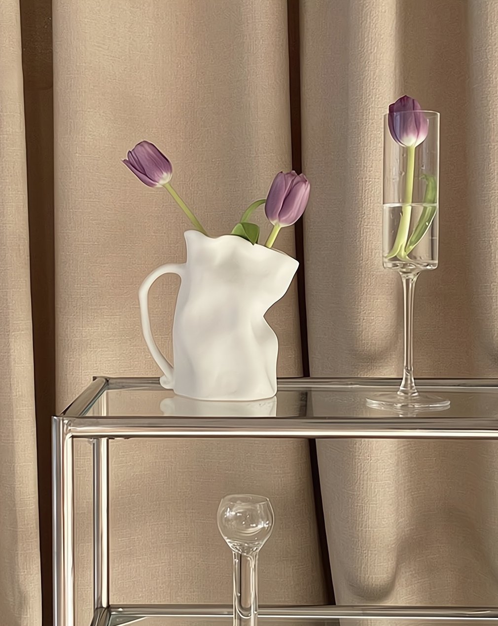 Handcrafted Nordic Style Wrinkle Pottery Jug Vase in black and white, showcasing its unique irregular shape and artisan craftsmanship.