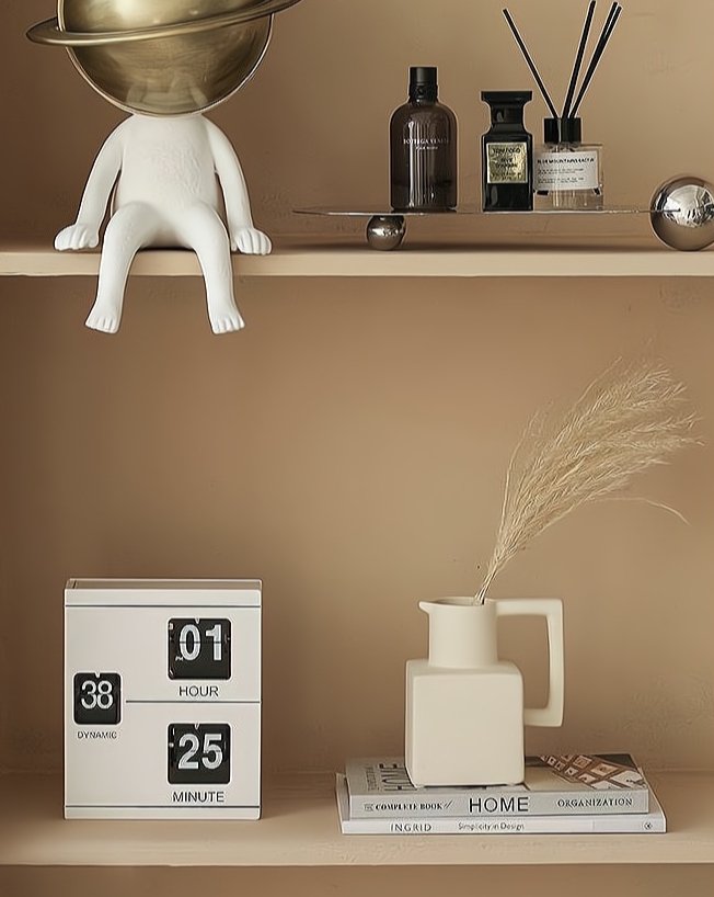 A unique handmade ceramic jug pitcher vase with a spout and handle, showcasing a modern minimalist design, perfect for decorative use.