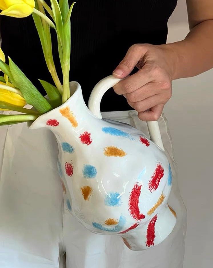 Handmade Nordic style pottery jug vase with a minimalist design, perfect for floral arrangements and home decor.