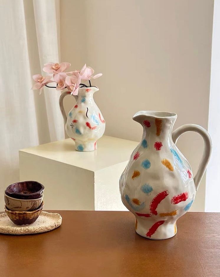 Handmade Nordic style pottery jug vase with a minimalist design, perfect for floral arrangements and home decor.