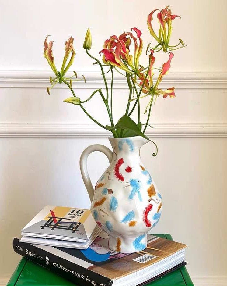 Handmade Nordic style pottery jug vase with a minimalist design, perfect for floral arrangements and home decor.