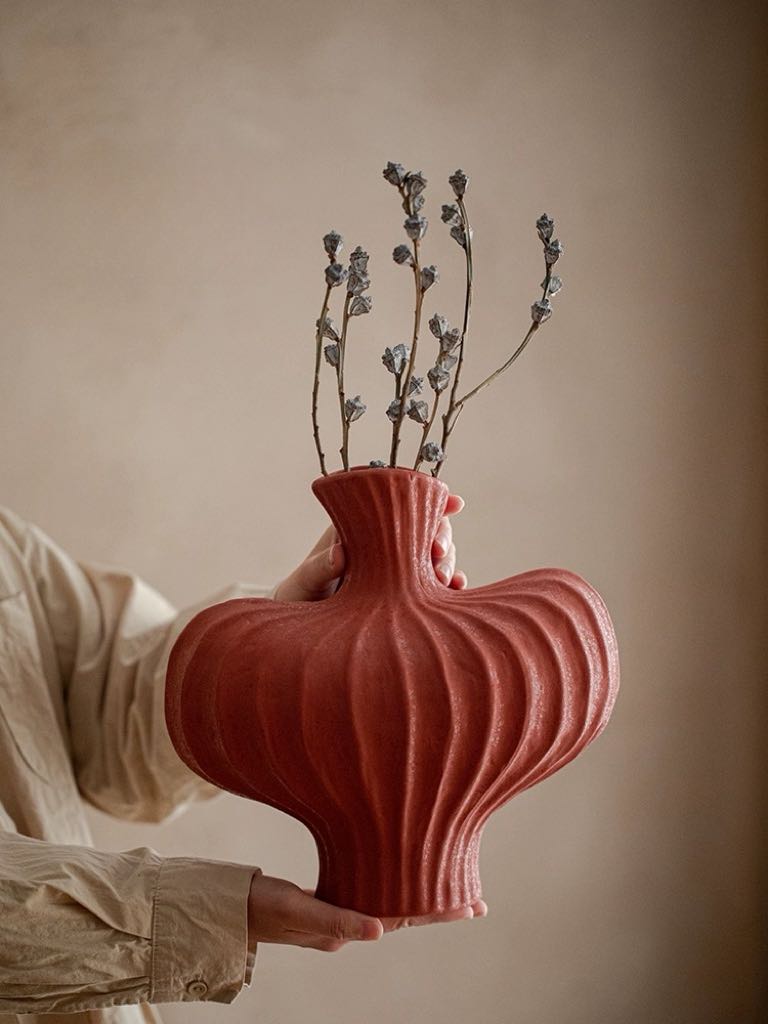 Handmade Wabi Sabi Ceramic Pottery Vase in red, black, and white, showcasing unique texture and artistic design.
