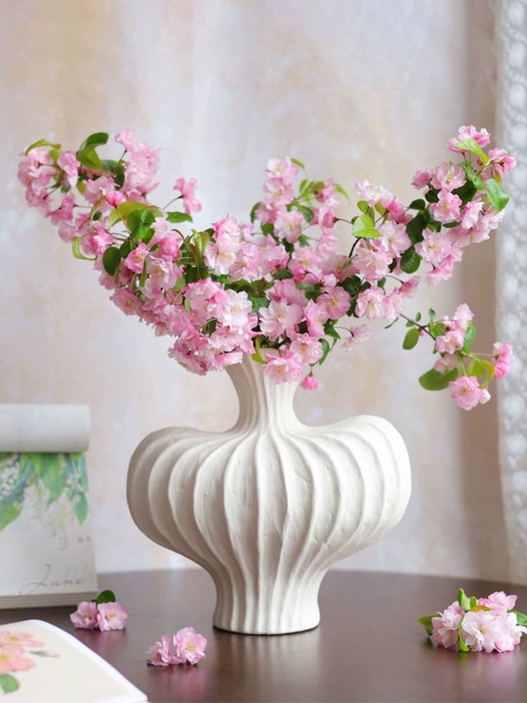 Handmade Wabi Sabi Ceramic Pottery Vase in red, black, and white, showcasing unique texture and artistic design.