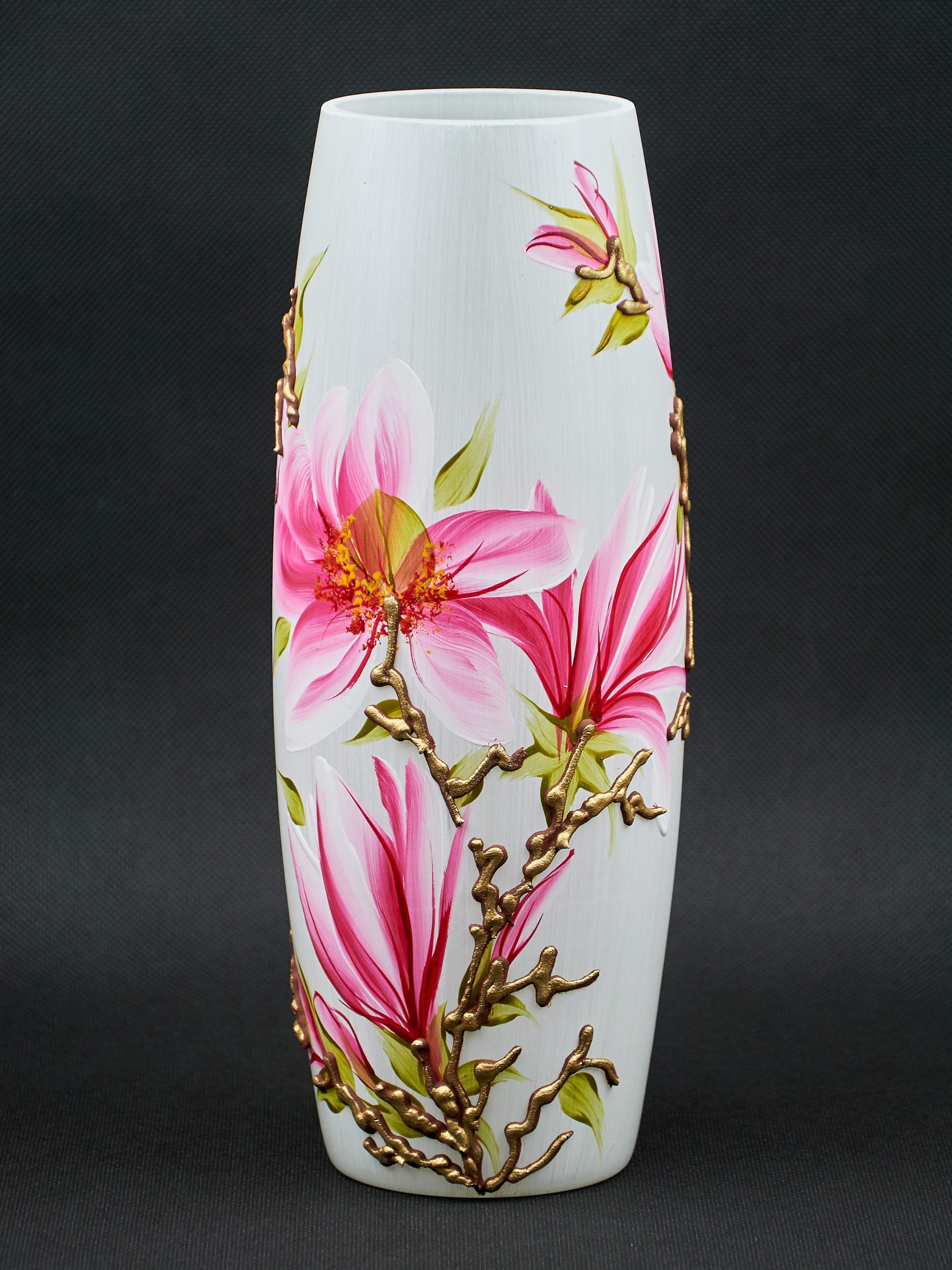 A beautifully hand-painted glass vase featuring unique floral and geometric designs, perfect for displaying flowers in any interior setting.