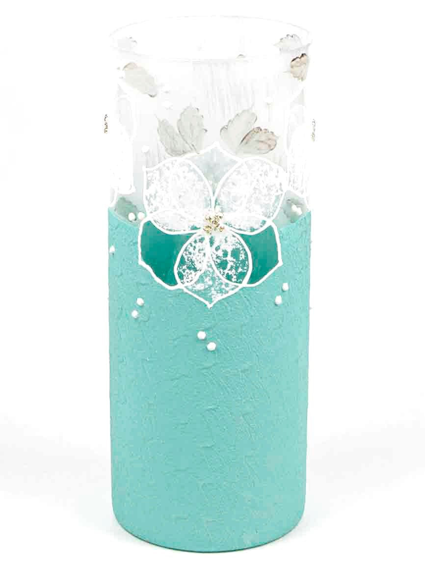 A beautifully hand-painted blue glass vase featuring unique floral and geometric designs, perfect for displaying flowers.