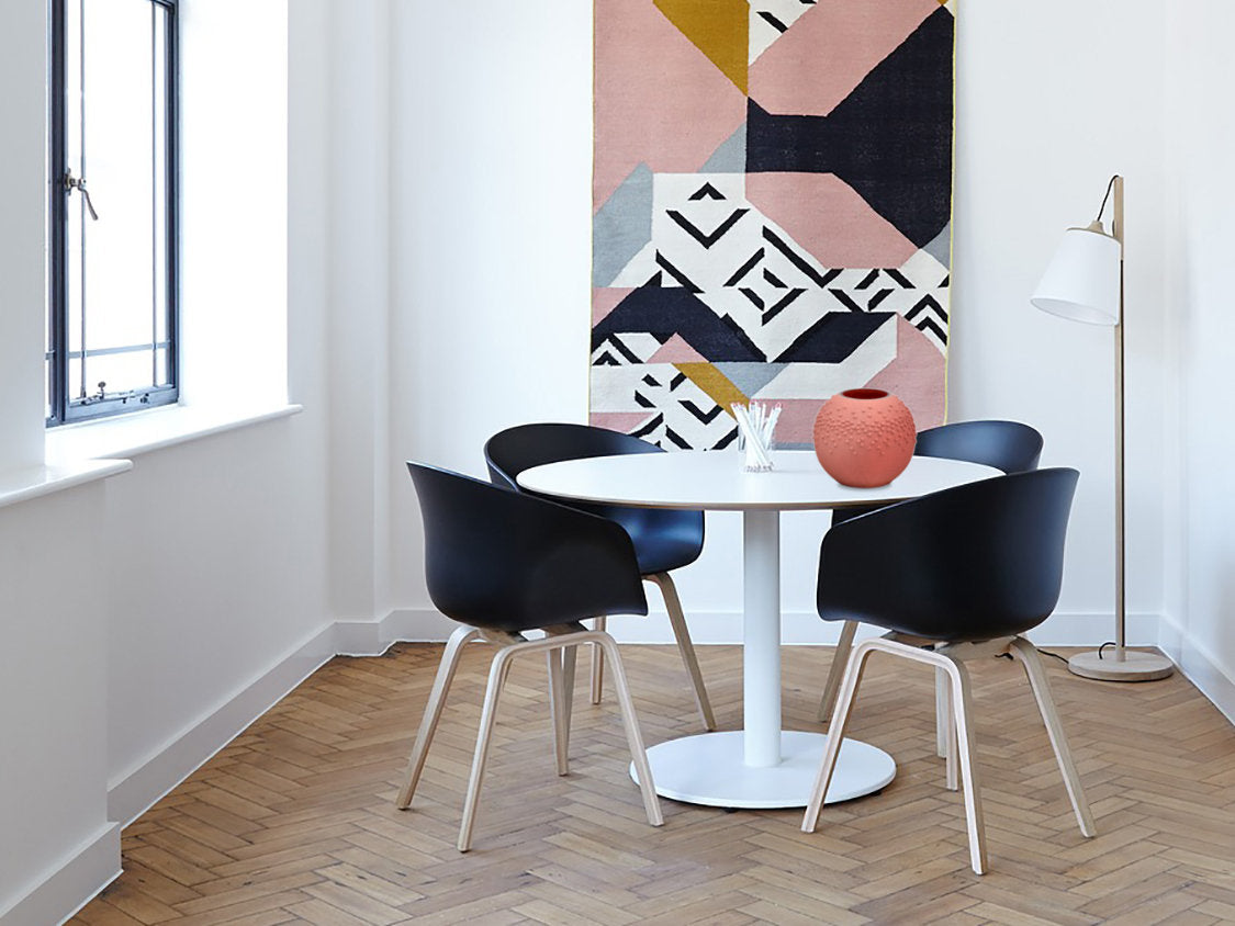 A beautifully hand-painted glass vase featuring intricate floral and geometric designs, showcasing vibrant colors and unique artistry.