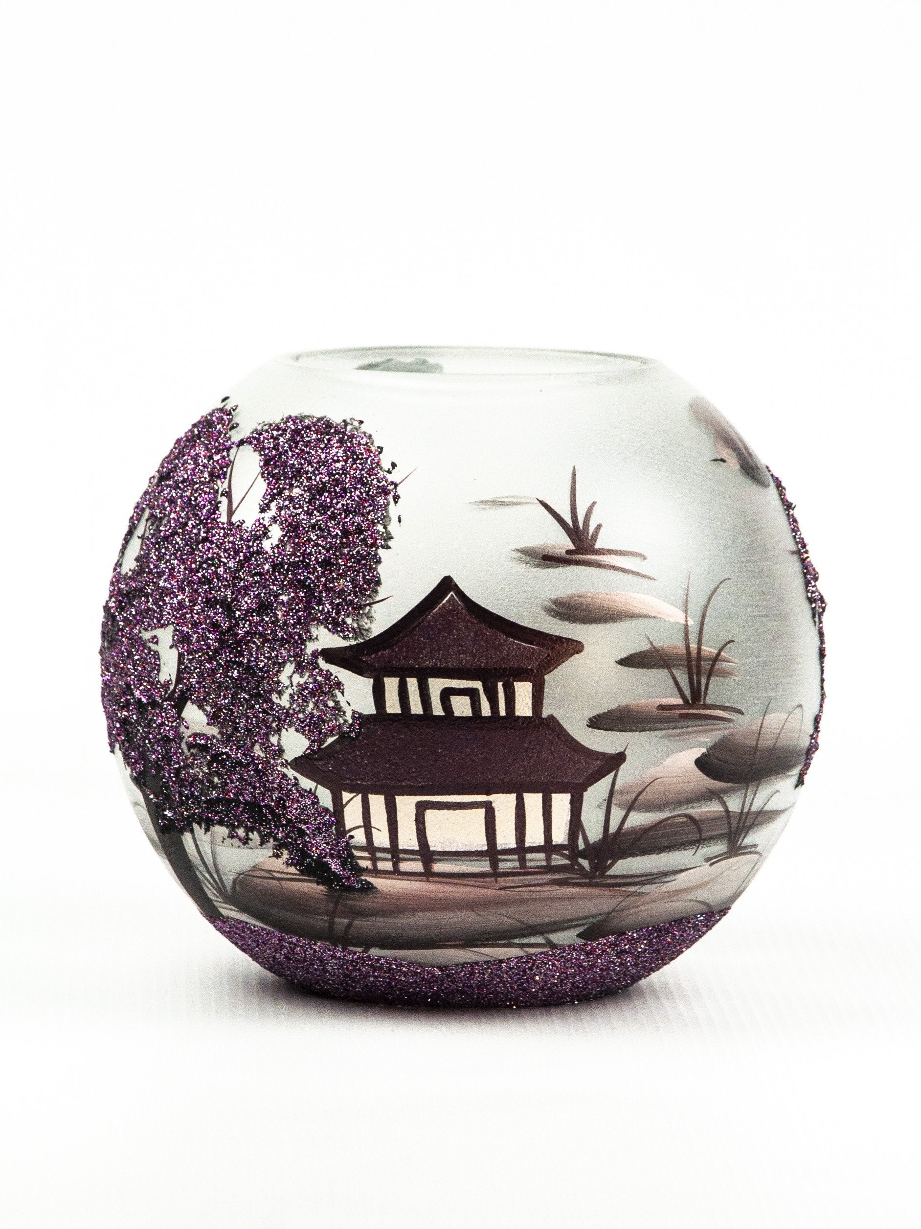A beautifully hand-painted glass vase featuring intricate floral and geometric designs, showcasing vibrant colors and unique craftsmanship.