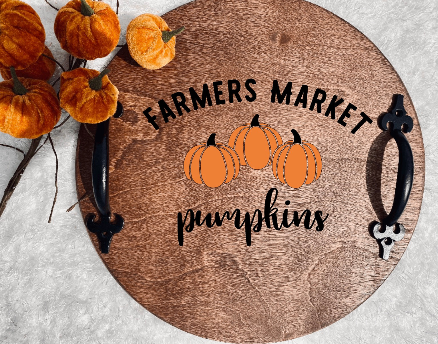 Hand-painted wooden serving tray with black and orange design, featuring black metal handles, made from birch plywood.