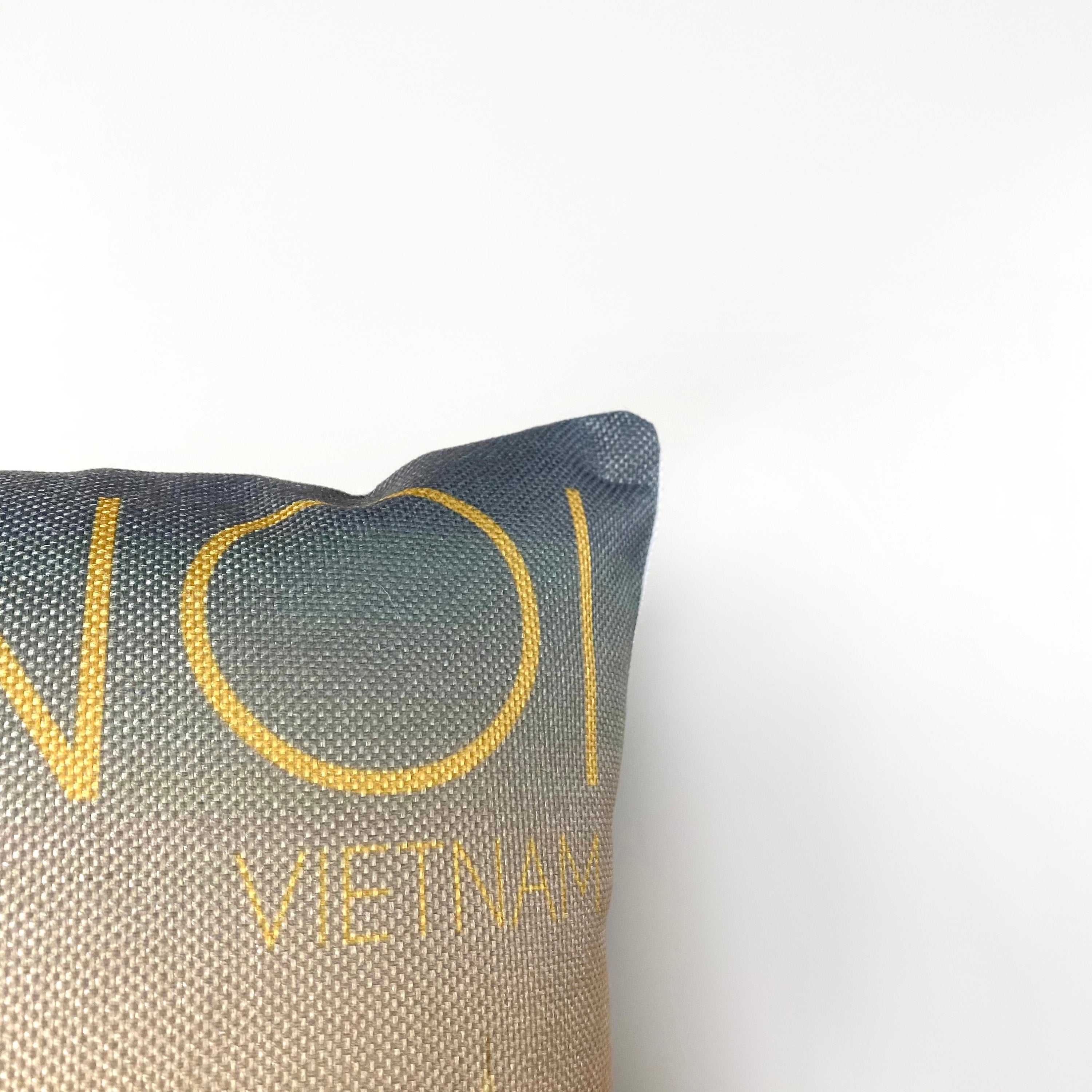 Colorful 12x18 pillow cover featuring a sunset and city reflection of Hanoi, Vietnam, with a concealed zipper.