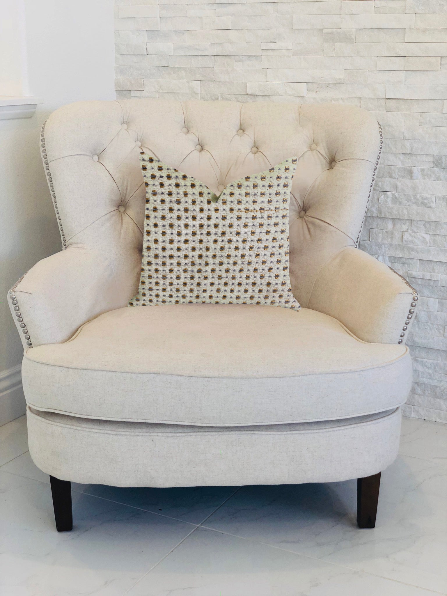 Haven Pointe patterned luxury throw pillow in gold and beige, showcasing a stylish design with an invisible zipper and high-quality fabric blend.