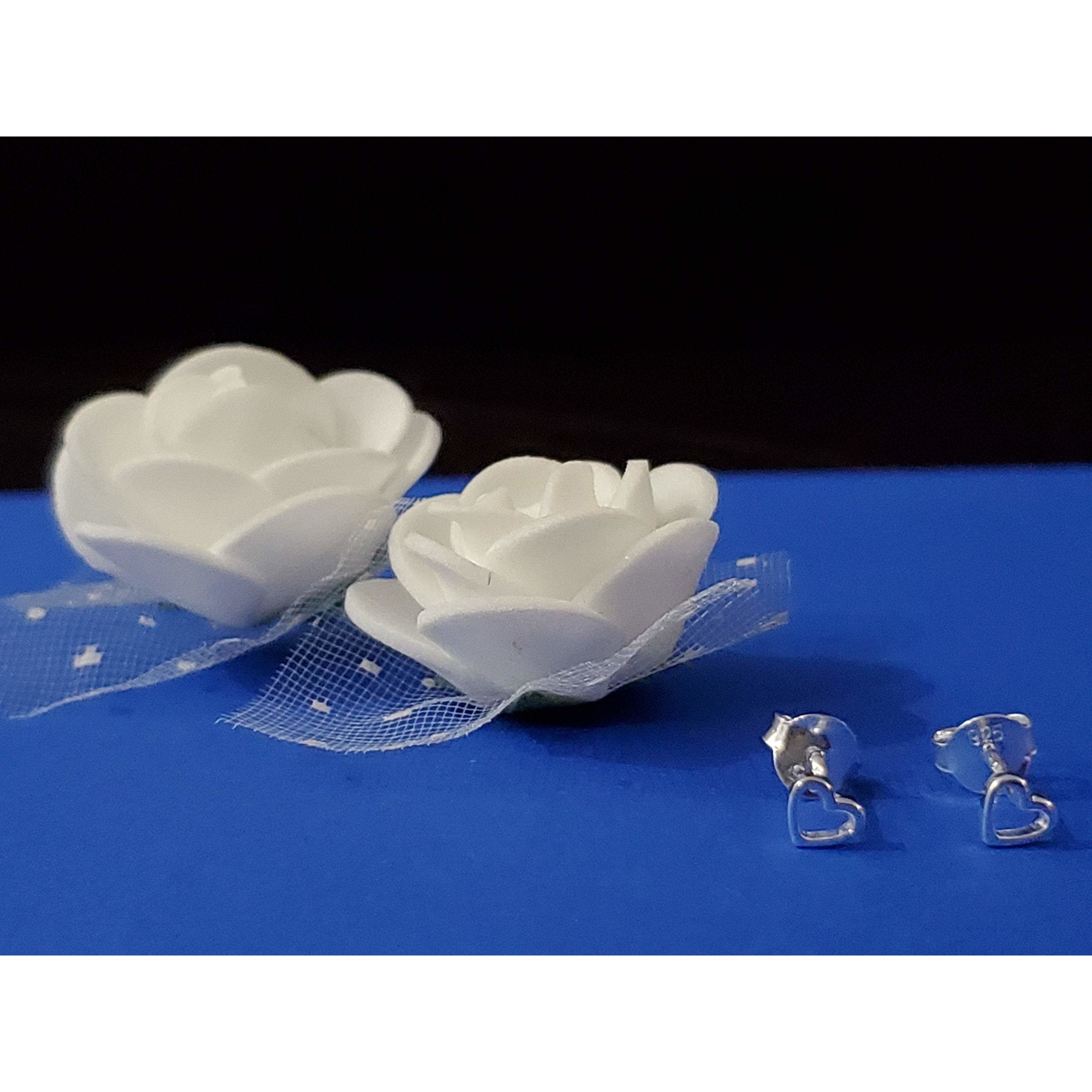 Heart Shape Openwork Sterling Silver Earrings Studs with intricate design and high polish finish, perfect for elegant occasions.