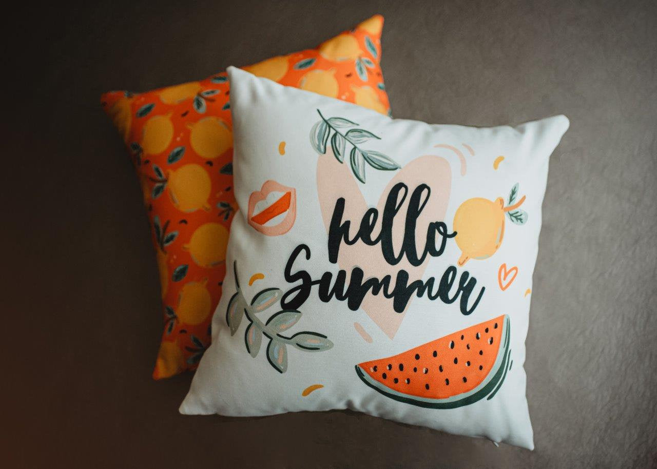 Hello Summer pillow cover featuring vintage design with hand-drawn pictures and cheerful colors, perfect for beach-themed decor.