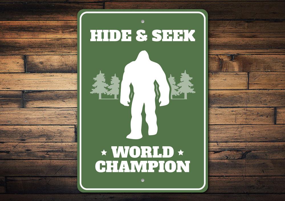 Hide & Seek World Champion Bigfoot Sign made of aluminum, featuring a playful design perfect for home decor.