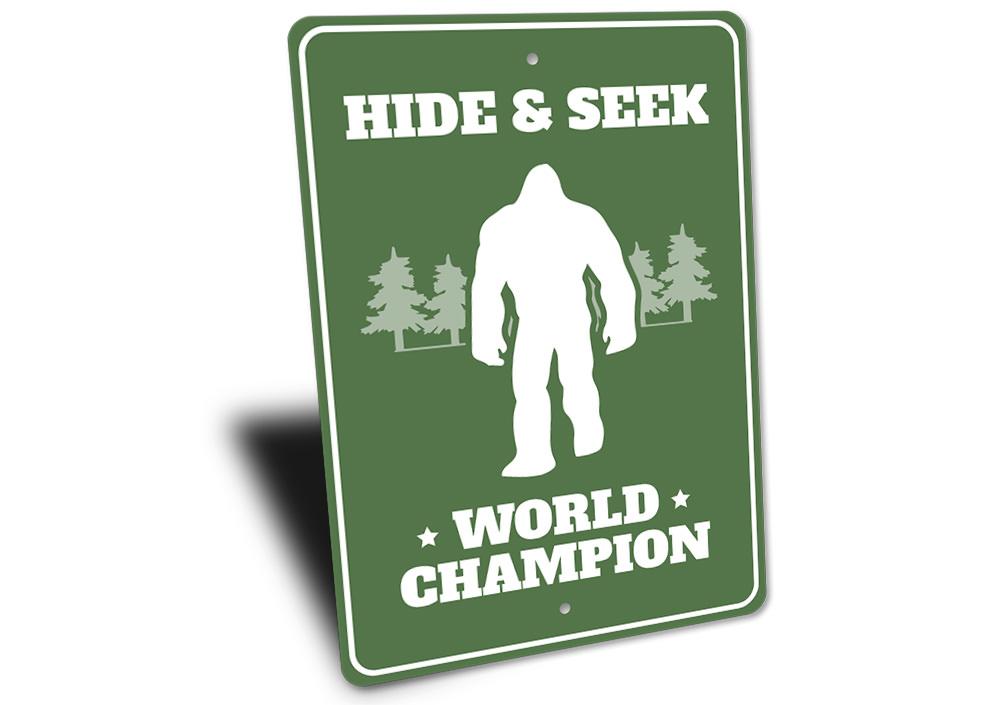 Hide & Seek World Champion Bigfoot Sign made of aluminum, featuring a playful design perfect for home decor.