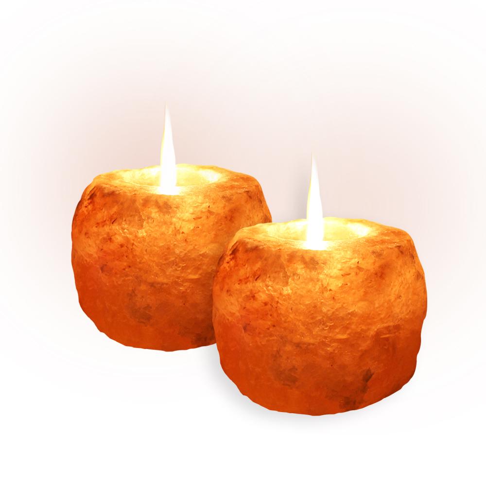 Himalayan Rock Salt Candle Holder in pink, showcasing its unique shape and natural texture, perfect for home decor and air purification.
