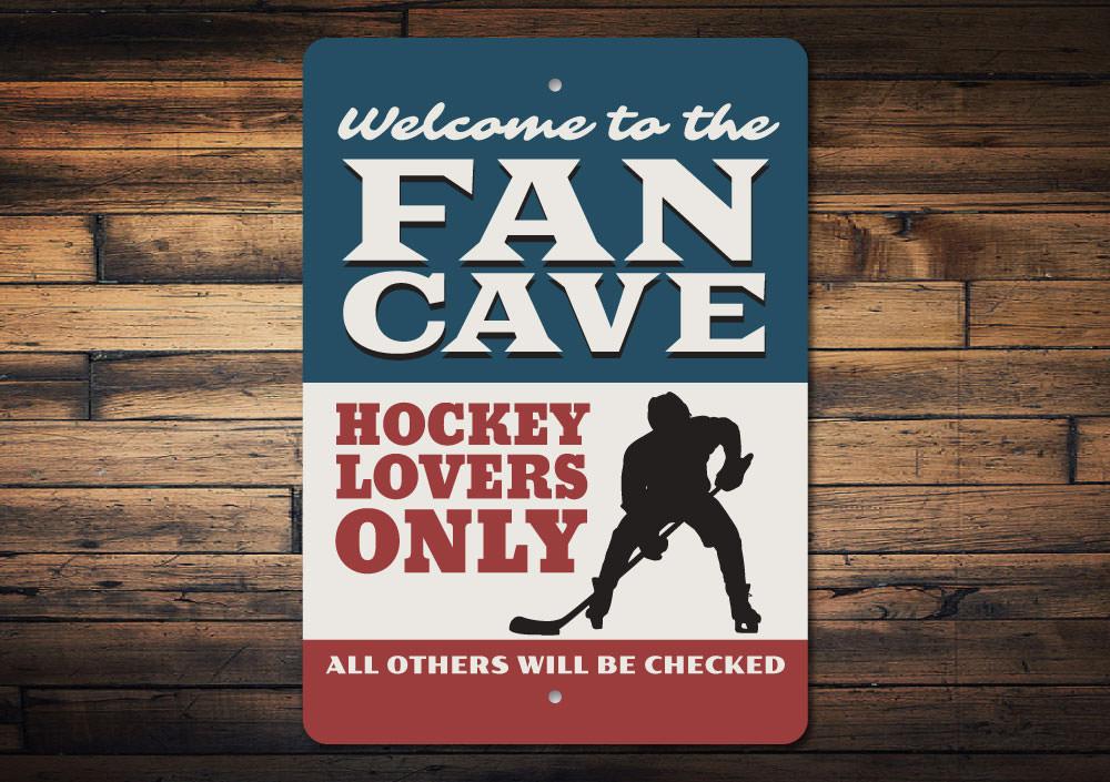 A decorative Hockey Fan Cave Sign made of aluminum, featuring vibrant colors and customizable text, perfect for any hockey enthusiast's space.
