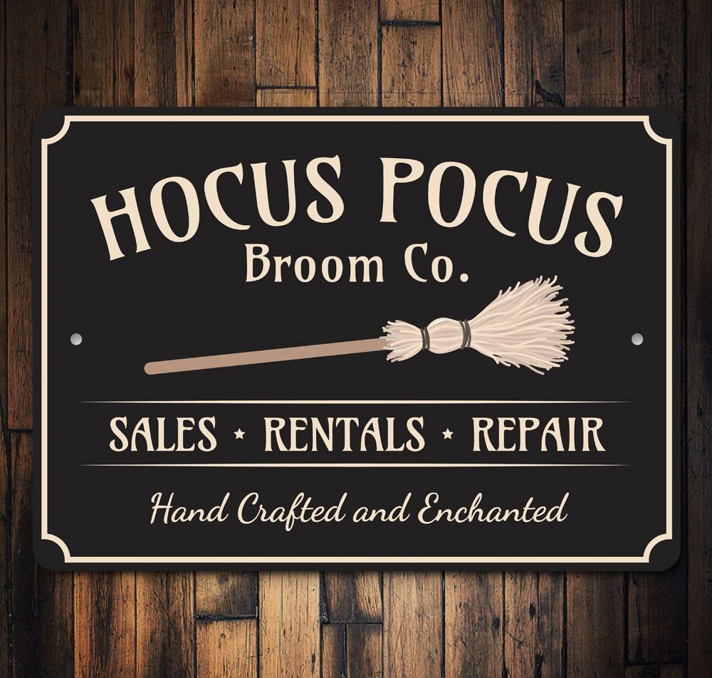 Hocus Pocus Broom Company Sign featuring spooky Halloween design, made from high-quality aluminum with pre-drilled holes for easy mounting.