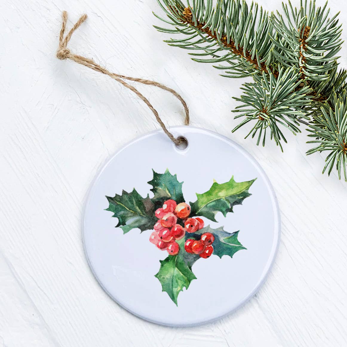 Holly and Berries porcelain ornament featuring vibrant design, smooth glossy finish, and 2.75-inch diameter.