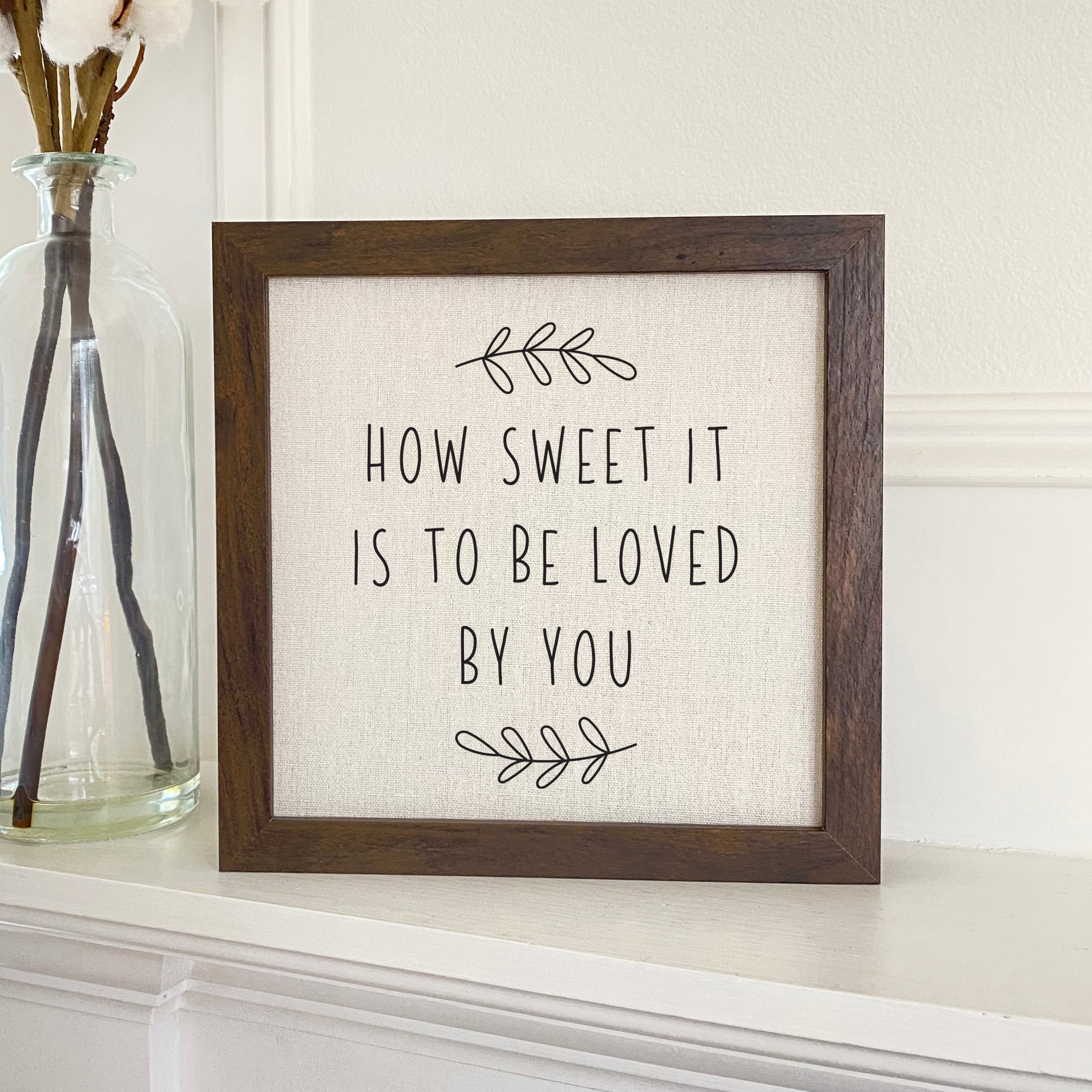 How Sweet it Is framed sign with a stylized wood frame, featuring eco-friendly ink printing on a linen-look background.