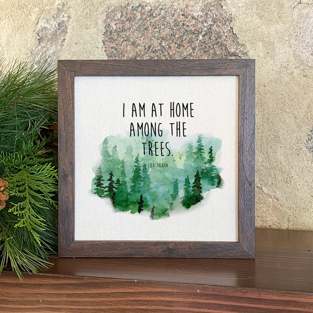 Framed sign with a tree design, eco-friendly inks, and a natural wood frame, perfect for home decor.
