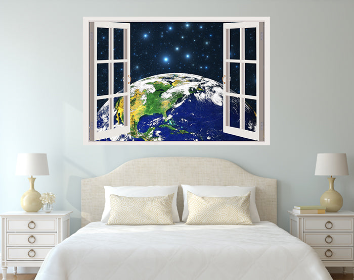 A vibrant living room featuring impressive 3D window wall decals, showcasing a scenic view with colorful designs on a smooth wall surface.