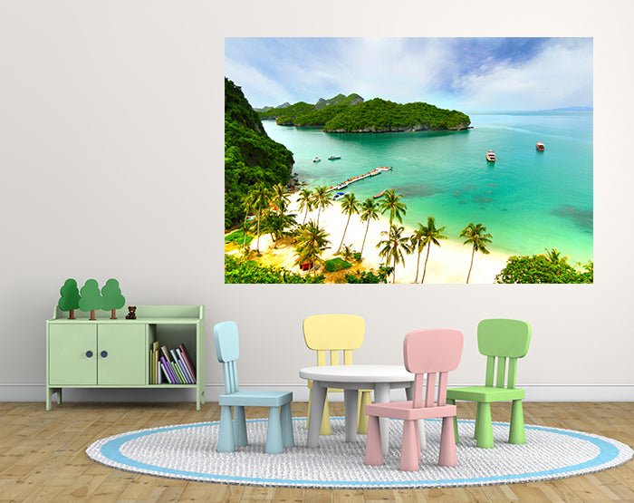 Colorful removable wall decals displayed on a smooth surface, showcasing various designs and patterns.