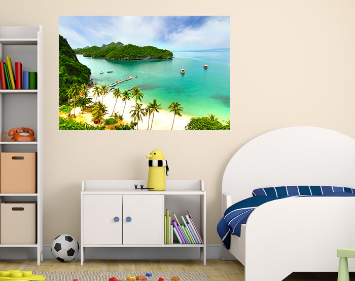 Colorful removable wall decals displayed on a smooth surface, showcasing various designs and patterns.