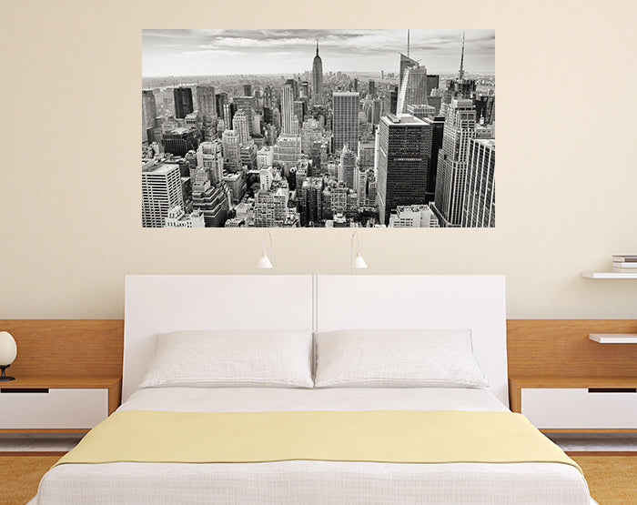 Colorful removable wall decals displayed on a smooth wall, showcasing various designs and patterns.