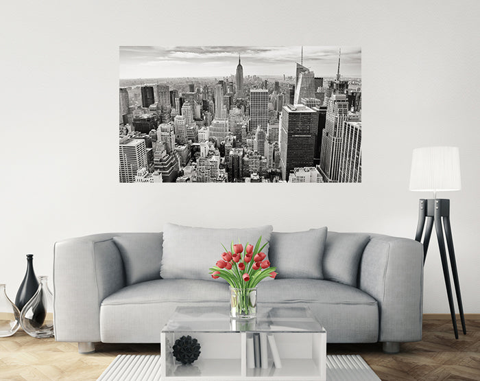 Colorful removable wall decals displayed on a smooth wall, showcasing various designs and patterns.