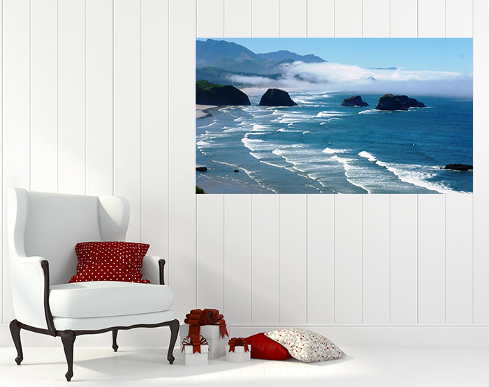 A collection of colorful removable wall decals displayed on a smooth surface, showcasing various designs and patterns.