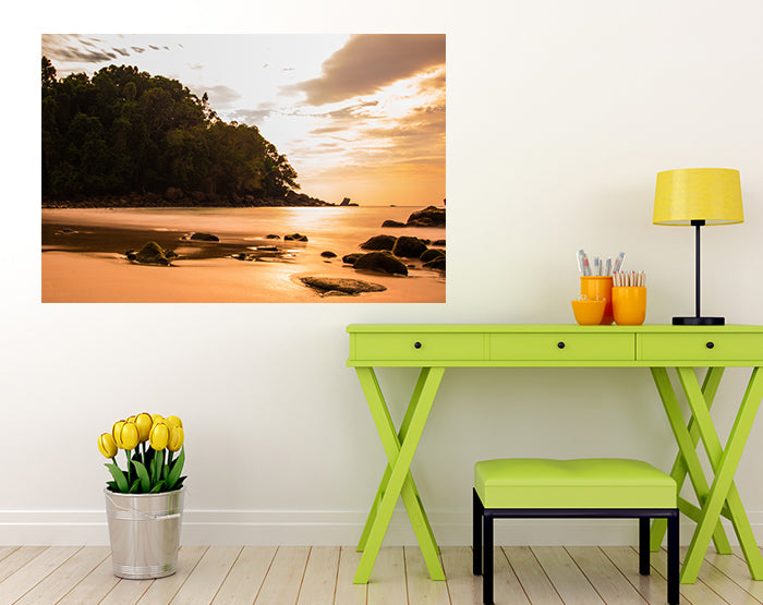 A collection of colorful removable wall decals displayed on a smooth surface, showcasing various designs and patterns.