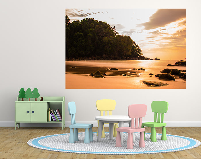A collection of colorful removable wall decals displayed on a smooth surface, showcasing various designs and patterns.