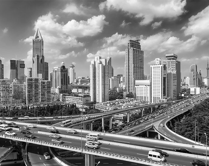 A collection of colorful removable wall decals displayed on a smooth surface, showcasing various designs and patterns.