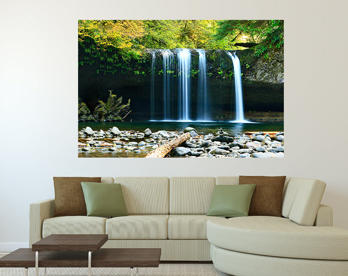 A collection of colorful removable wall decals displayed on a smooth surface, showcasing various designs and patterns.