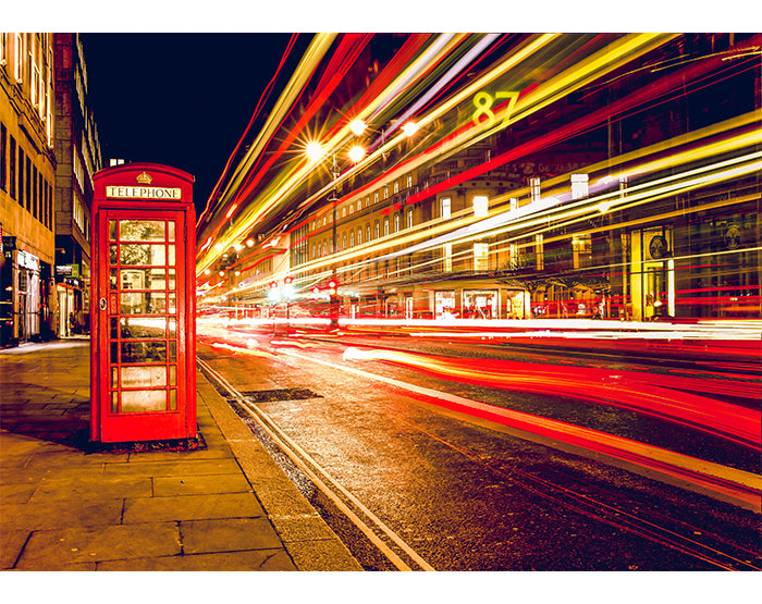 A collection of colorful removable wall decals displayed on a smooth surface, showcasing various designs and patterns.