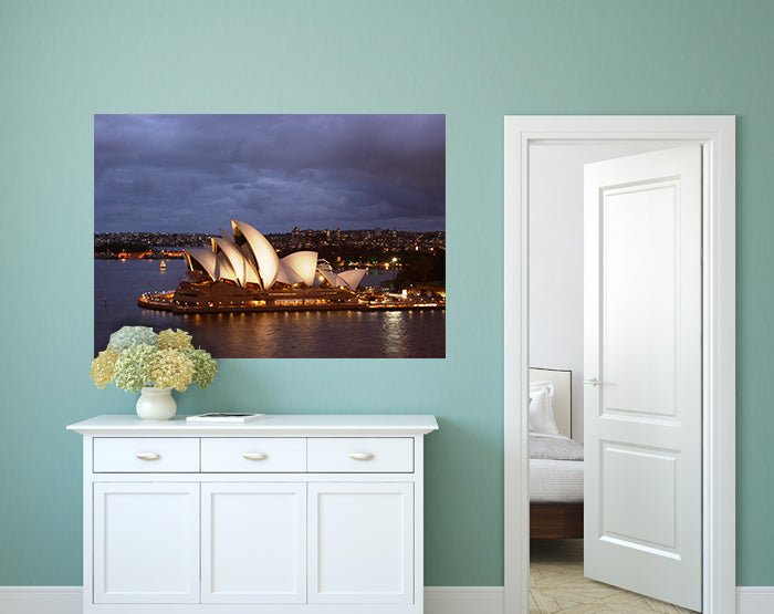 A collection of colorful removable wall decals displayed on a smooth surface, showcasing various designs and patterns for home decor.