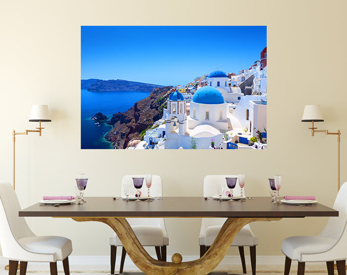 A collection of colorful removable wall decals displayed on a smooth surface, showcasing various designs and patterns.