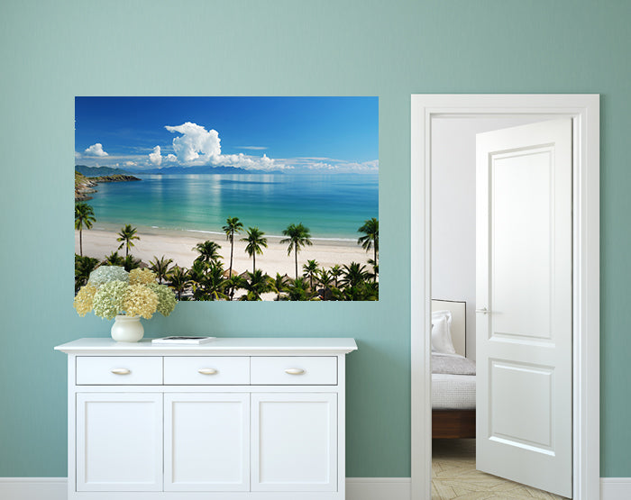 A collection of colorful removable wall decals displayed on a smooth surface, showcasing various designs and patterns.