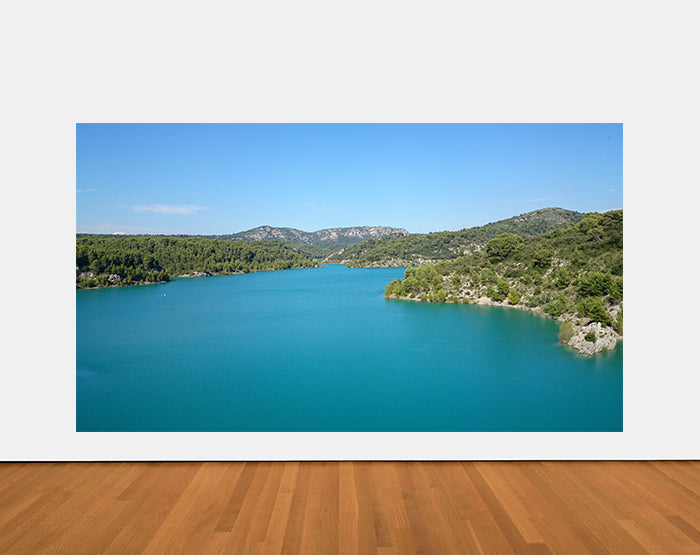 A collection of colorful and stylish removable wall decals displayed on a smooth surface, showcasing various designs and patterns.