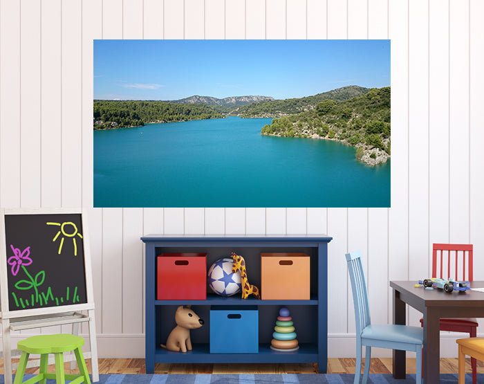 A collection of colorful and stylish removable wall decals displayed on a smooth surface, showcasing various designs and patterns.