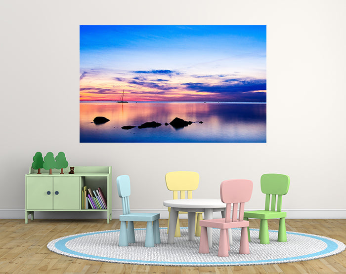 A collection of colorful and stylish removable wall decals displayed on a smooth surface, showcasing various designs suitable for home decor.