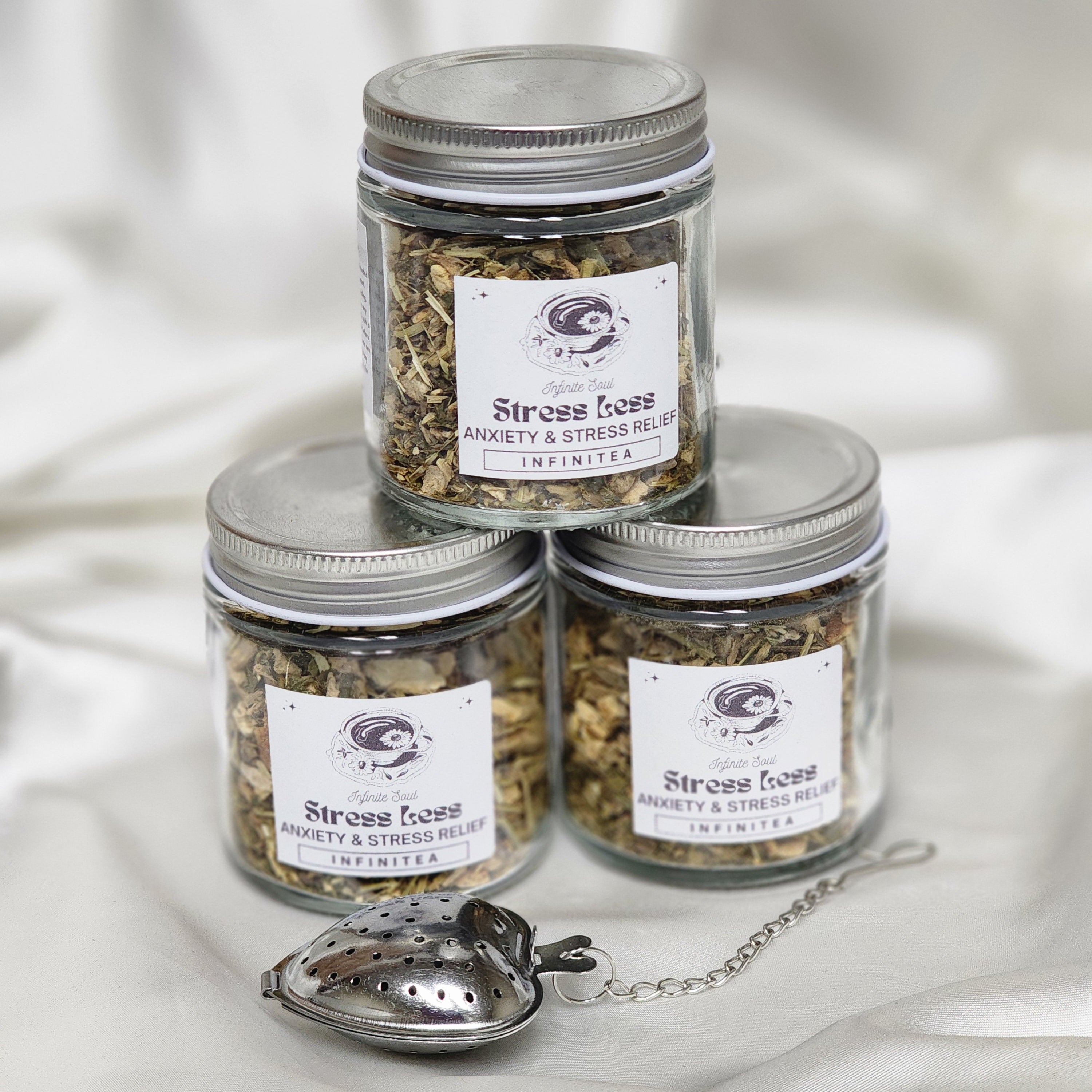 A calming cup of Infinitea Stress Less herbal tea with lavender and ginger, promoting relaxation and stress relief.