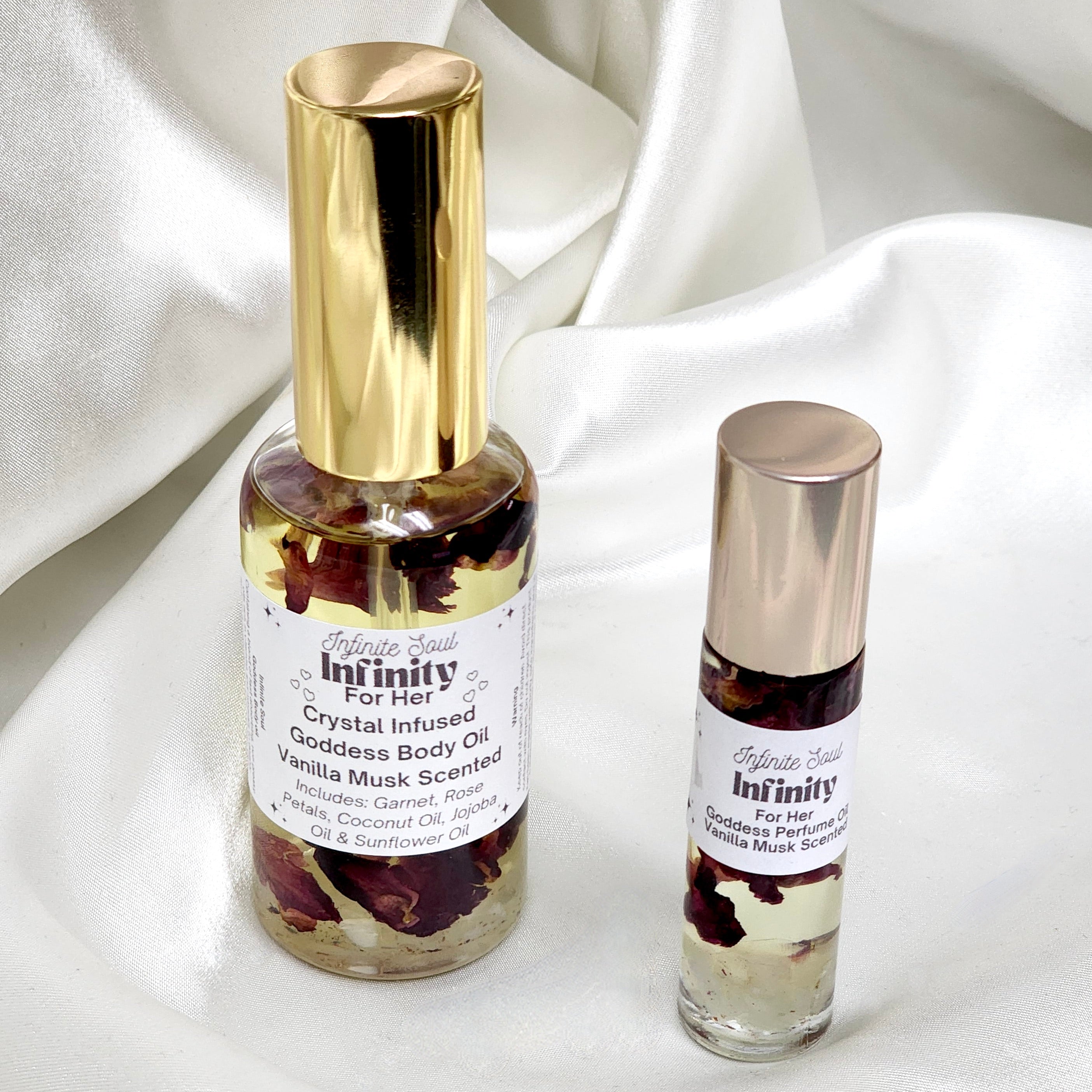 Infinity: For Her Crystal Infused Goddess Body Oil with Jade chips, rose petals, and a luxurious vanilla and musk scent.